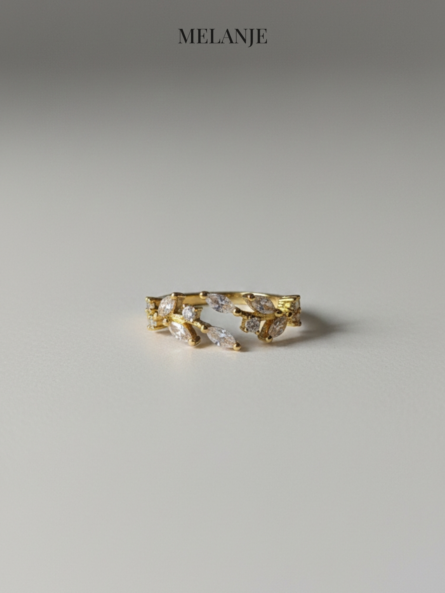 Yellow Gold Bypass Leaf Ring – Marquise & Round Cut Cubic Zirconia