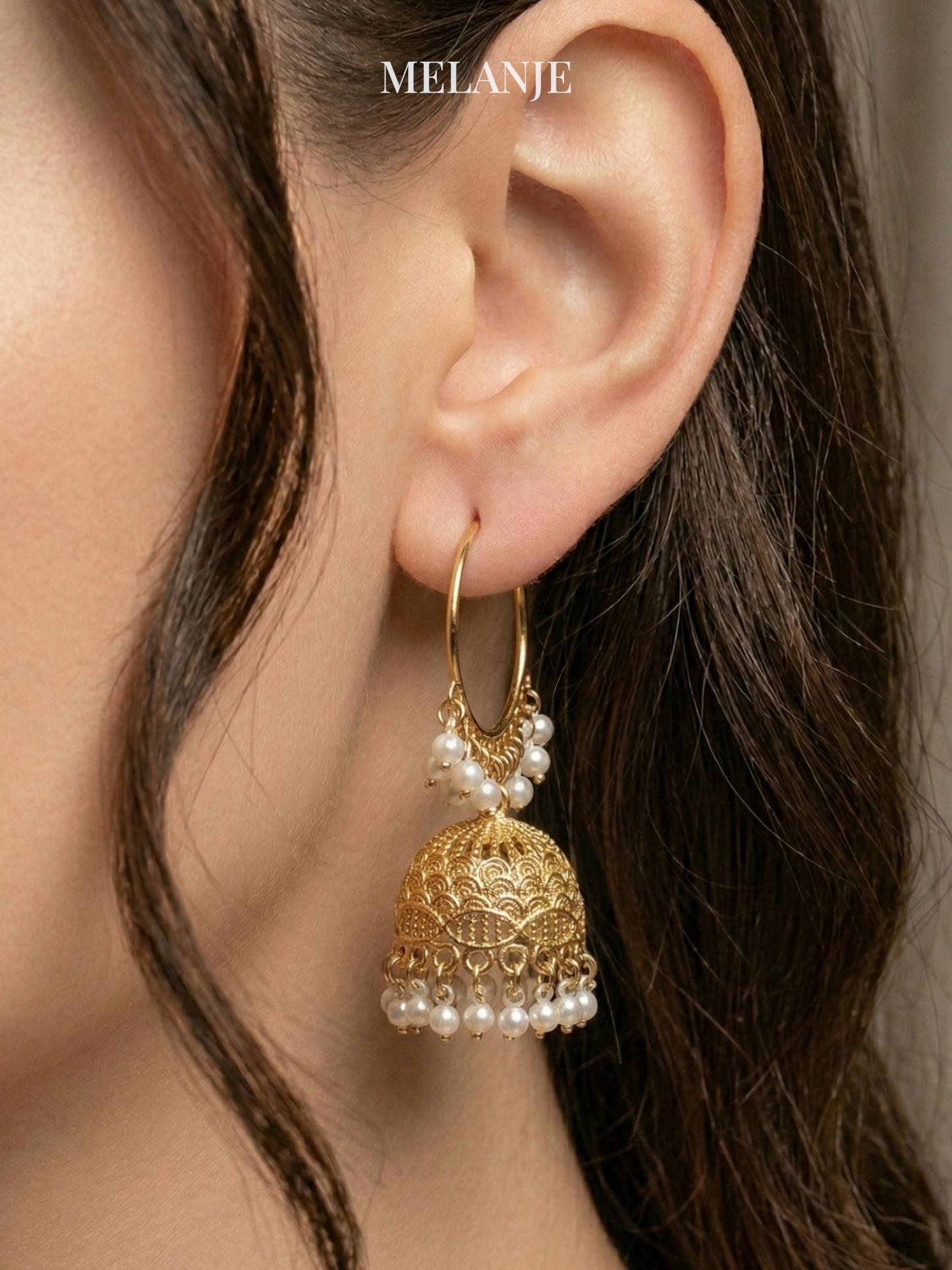Golden Bali Jhumka Earrings with Pearls & Intricate Detailing