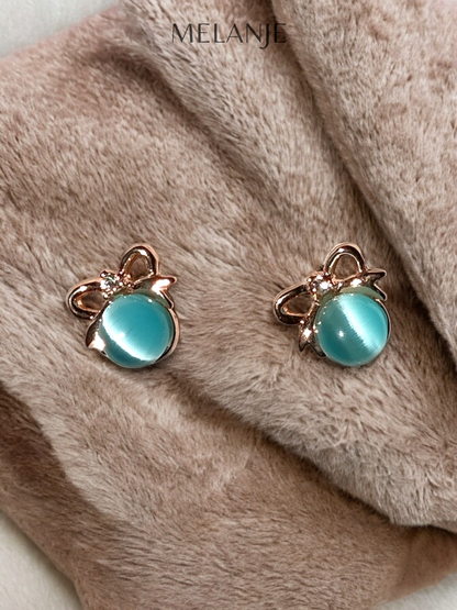 1K Gold Plated Light Blue Pearl Coquette Studs