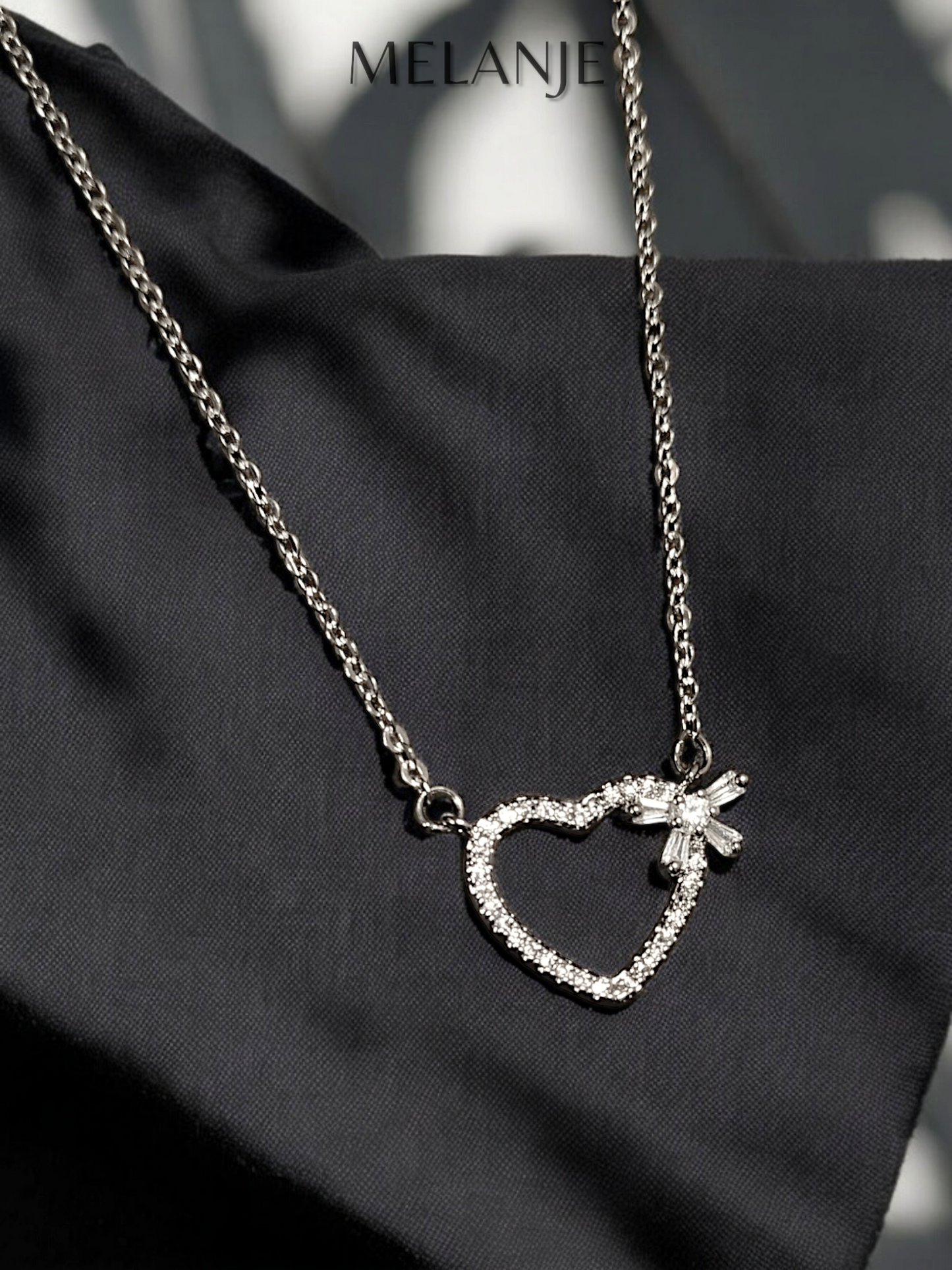 Sterling Silver Cubic Zirconia Minimal Heart Bow Charm Necklace