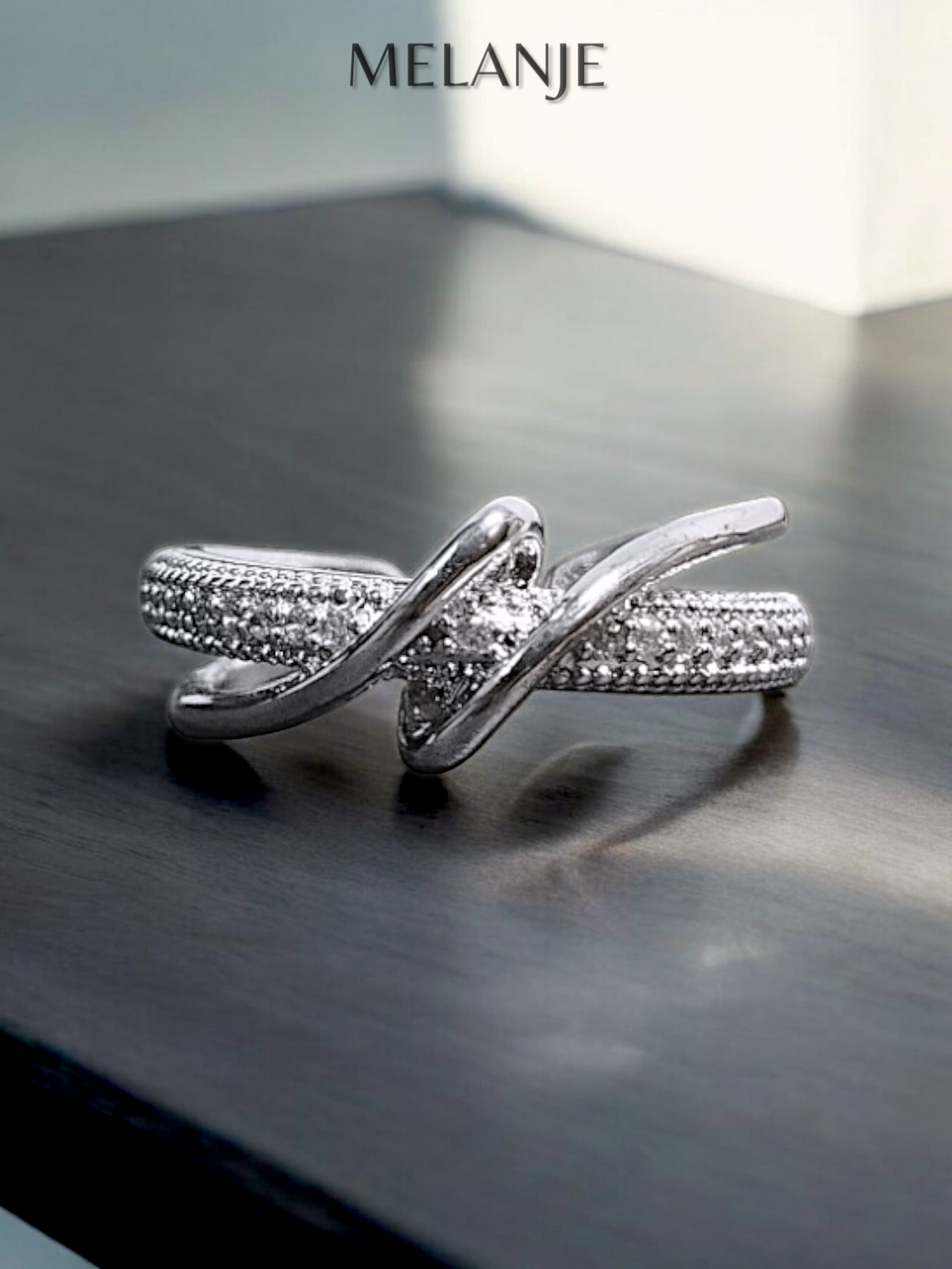 Sterling Silver Single Row Cubic Zirconia Interlaced Adjustable Cuff Ring