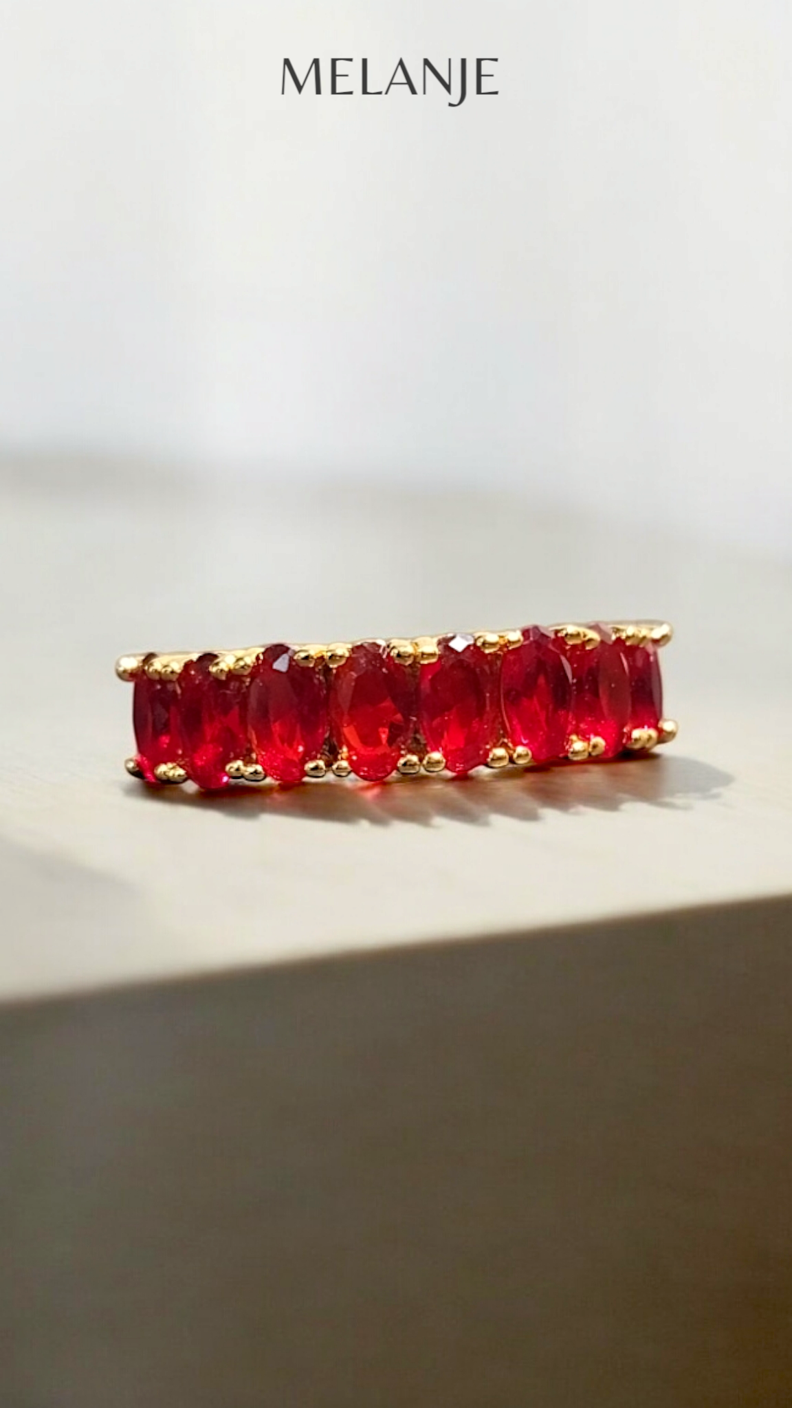 Oval Cut Garnet Cubic Zirconia Single Row Adjustable Gold Band Ring