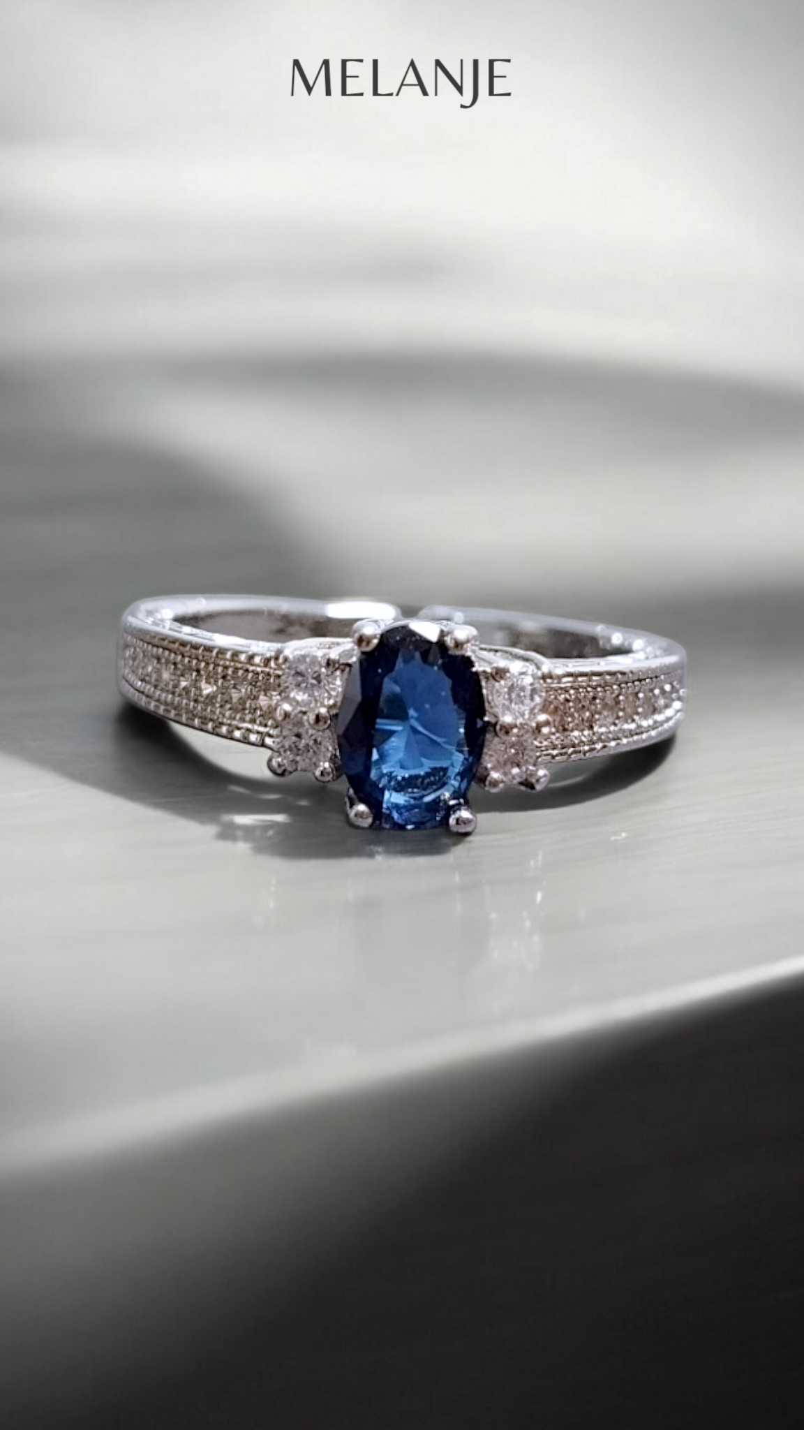 Sterling Silver Sapphire Blue Oval Solitaire Crystal Single-Row Design Adjustable Ring