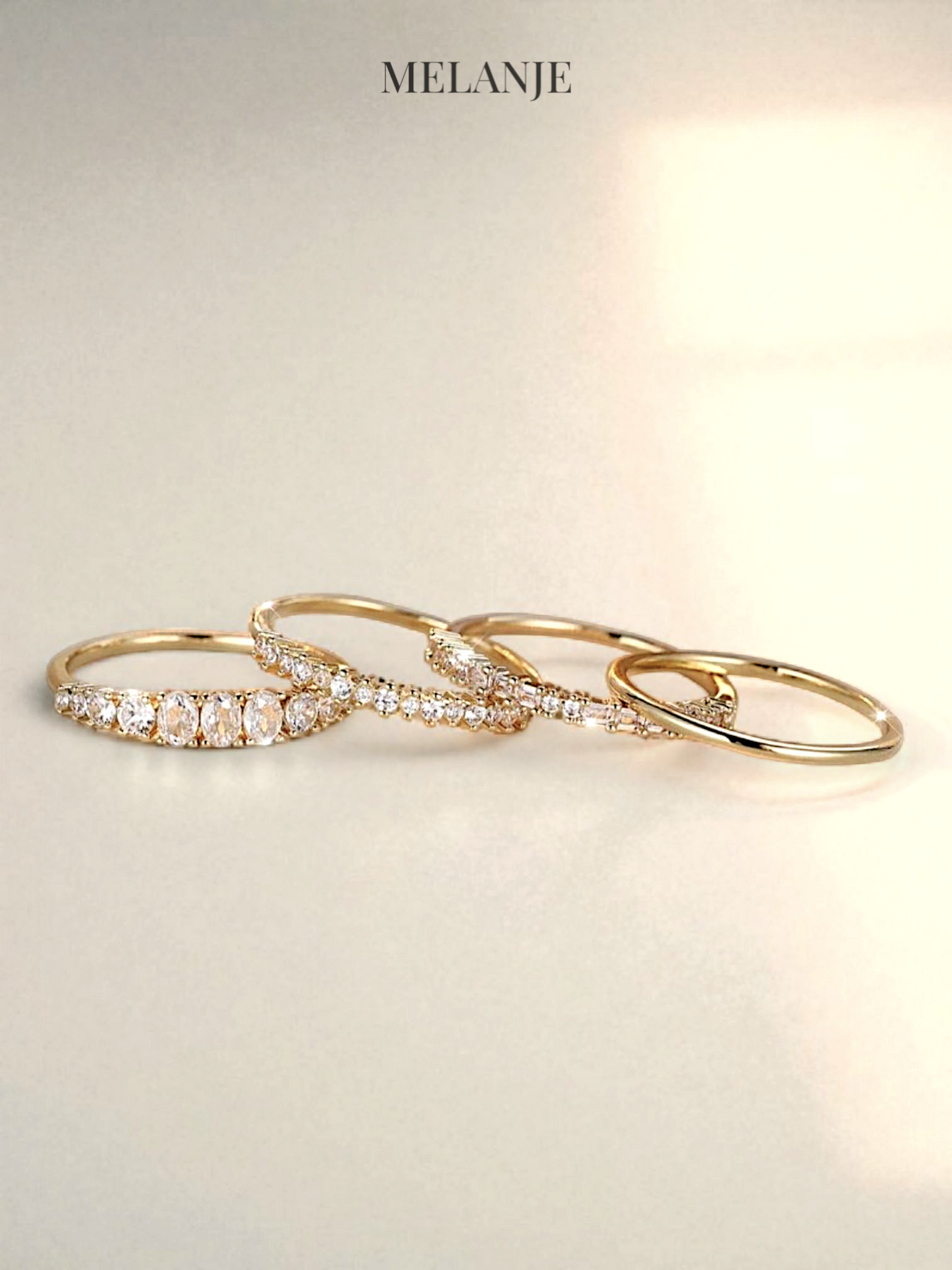 Four-Piece Elegant Minimal Gold Stackable Ring Set