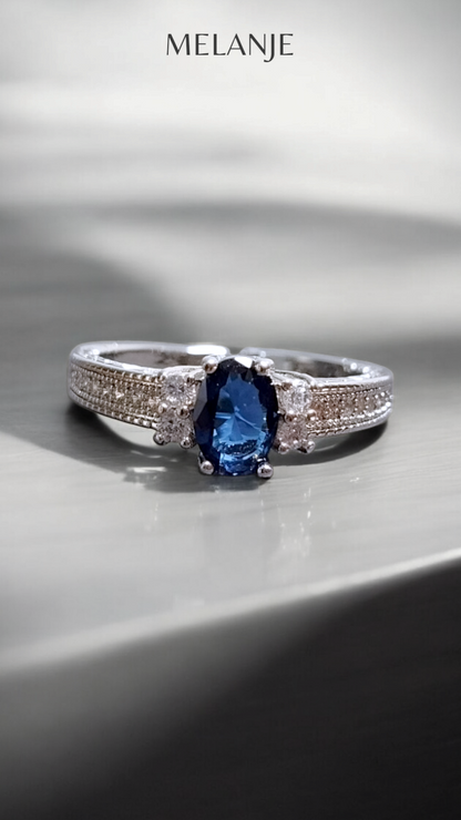 Sterling Silver Sapphire Blue Oval Solitaire Crystal Single-Row Design Adjustable Ring
